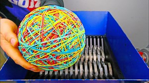 Watch This Massive Rubber Band Ball Explode Inside a Shredder