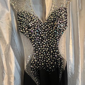 Stunning black long glitter dress, with a double slit!