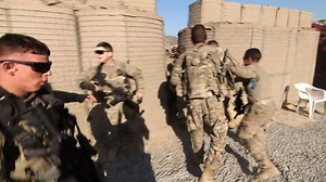 US troops scramble as rockets strike Afghan base