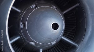 Close-up of an engine turbine combustion chamber of a jet engine with high-resistance alloy blades. Aircraft engine jet nozzle. Rotor blades of a reactive drive engine for a helicopter turbine.