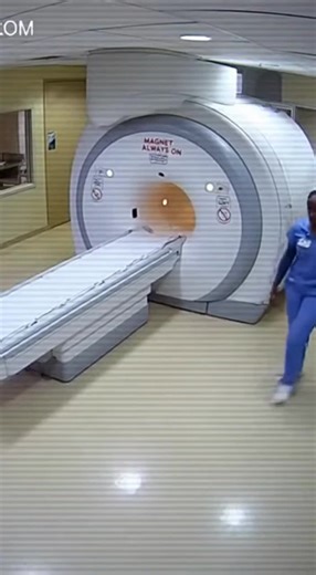 What happens when metal enters an active MRI room? 😨 This hyper-realistic CCTV footage captures a terrifying moment inside a hospital MRI suite. A nurse carrying a small metal instrument walks too close to the scanner — and within seconds, the powerful magnetic field activates. The metal tool flies from her hand. She’s violently pulled toward the machine. Doctors rush in as the situation spirals out of control. MRI machines are incredibly powerful — and even small mistakes can turn dangerous in