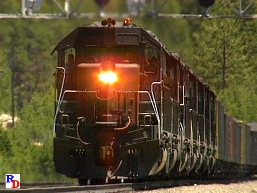 A heavy coal train has a restricted speed as it descends Donner Pass. The sight of a lot of power from the Denver & Rio Grande Western is a good indication of the train's origin. From the Pentrex show "Donner Pass Combo: Battle for Donner Pass & Across Donner Summit" https://rfd.video/DonnerCombo | Railfan Depot