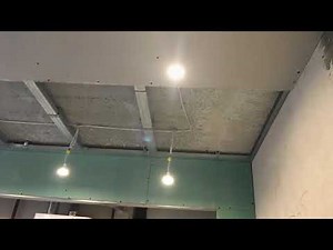 Plasterboard suspended ceiling for installation of lighting and noise reduction