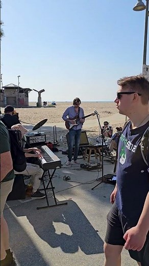 Street Performers having a jam session at Venice Beach in California