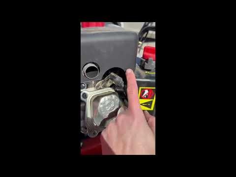 How to change the spark plug in an Ariens Deluxe 28 snow blower