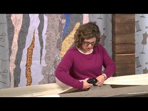 Stapling the Quilt Back to Leaders on Your Longarm