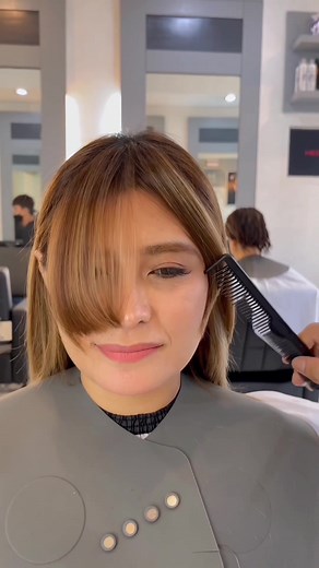 Mid Length Layered Hair with Curtain Bangs