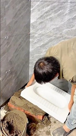 Installation of a Squat Toilet Pan