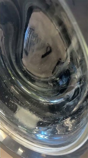 Washing a small load of clothes at laundromat