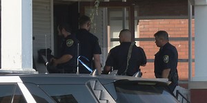 Quincy police search house for wanted man with alleged gun