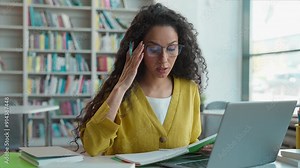 Indian Latina Hispanic woman professor teacher laptop computer talk explain online learning web conference study lesson lecture girl female library university educational academy seminar technology