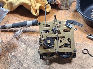 How to assemble a Regula 34 8 day movement, showing parts, function tests/issues that might come up