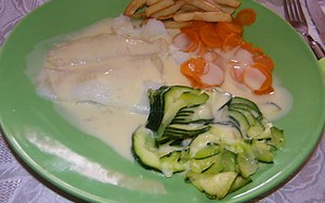 Filet de flétan sauce agrume et ses petits légumes