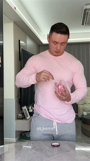 The husband cannot believe that his wife cannot even open a small jar.