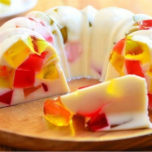 2.4M views · 8.1K shares | Cathedral Window Gelatin is a show-stopping dessert masterpiece perfect for the holidays. Soft, creamy and silky with colorful gelatin, it’s as amazing as it looks! Get the Full Recipe: https://www.kawalingpinoy.com/cathedral-window-gelatin/ | Kawaling Pinoy Recipe Blog | Facebook