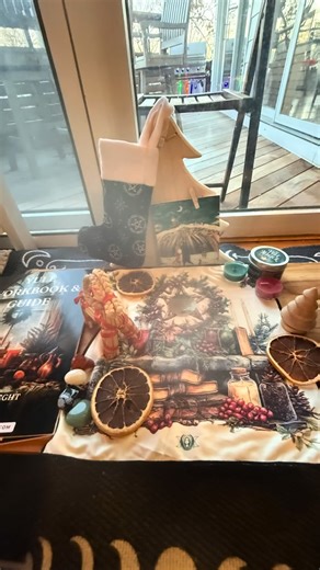 Building a Yule altar is about honoring the season, the elements, and the quiet magick of winter. 🌲✨ I started with an altar cloth and a picture of winter animals to ground the space in the energy of the season...stillness, survival, and sacred rest. From there, I called in the elements: 🔥 Fire – Candles in red, green, and white for vitality, renewal, and peace 💧 Water – A Yule cleansing spray to purify and bless the space 🌍 Earth – Crystals of quartz, red carnelian, snowflake obsidian, and 