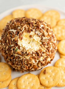 19K views · 96 reactions | https://buildyourbite.com/easy-cheese-ball-recipe/ You can’t go wrong with this easy cheese ball recipe with cream cheese and green onions. Made with sharp cheddar cheese, sour cream, and rolled in pecans. A delicious appetizer for your holiday gatherings! | Build Your Bite | Facebook