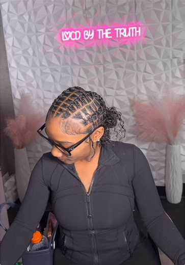 Stylish Starter Locs: Criss-Cross Bun Design