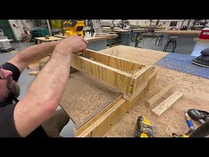 Flattening an end grain slab with a router sled.