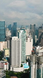Makati City: High Rise Buildings. Skyline in Metro Manila, Philippines. Vertical view.