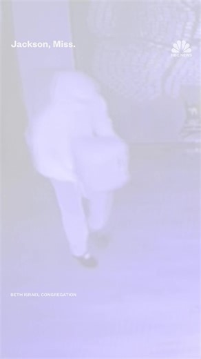 A video shows the alleged Mississippi arsonist dumping liquid inside the synagogue, which was later ablaze; no one was injured in the fire. | NBC News