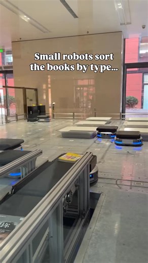 Moh | AI + Robotics & Automation Solutions📍Shenzhen, China 🇨🇳 on Instagram: "Shenzhen is the most futuristic city in the world. Even libraries are now automated with AI-powered robots 🤖📚. You’re looking at an “Automated Library” in Shenzhen, China 🇨🇳 — where robots handle book sorting, delivery, inventory management, and logistics with zero human intervention. This isn’t a concept. This isn’t a pilot. This is the current reality. As the government deploys thousands of AI robots into daily