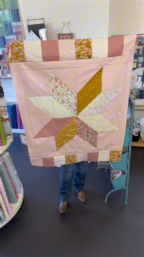 Here’s Blush N’ Butterscotch from Riley Blake! It’s a beautiful color palette for any season! I hacked the Villa Rosa Silver Star pattern to use 10” squares (and to get two baby quilts from this one 10 stacker)! There are more 10 stacker/layer cake patterns in the studio that would work beautifully if you love these gorgeous fabrics but want a bigger quilt! I also have a lovely blush pink companion print to Blush N’ Butterscotch! Come visit and put together your perfect combination! 🩷💛 | Laugh