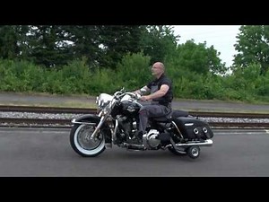 Költgen Behindertengerechter Motorrad und Fahrzeugumbau H D F.B.S._Harley with trainingwheels