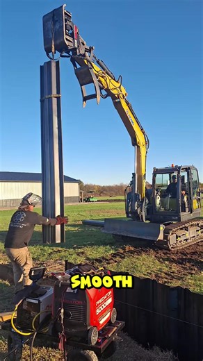 Watch how the vibratory pile driver presses each panel deep into the ground with smooth hydraulic rhythm. #MarineConstruction #EngineeringInAction #StrongFoundations | Factory Monster