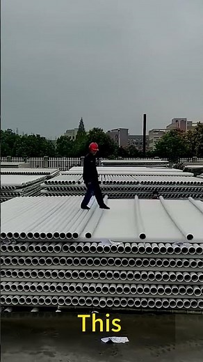 Workers ‘Walk’ on PVC Pipes to Load Trucks.Move 1000 PVC Pipes in 10 Minutes
