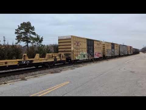CSX 3220 and CSX 3031 lead a BIG south bound mixed freight through downtown Fayetteville 3/2/2026