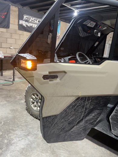 Exploring the Features of a Black and Beige UTV