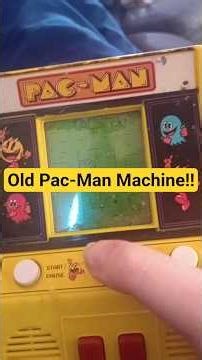 Using a very old Pac-Man Machine!