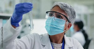 Woman, chemical in test tube and senior scientist in lab, chemistry and medical research for pharmacy and investigation. Biotech, science experiment and doctor in face mask with glass for liquid