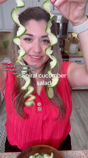 Spiraling cucumber salad 1 cucumber 10cherry tomatoes 2tbs vinegar 2tbs olive oil 1tbs miso 1tsp red pepper flakes 1tbs soy sauce Pinch salt 1/2 tbs sesame seeds 1 juice of a lime #LifeOnTikTok #TikTokPartner #whattocooktoday #saladideas #cucumbersalad #spiralcucumber