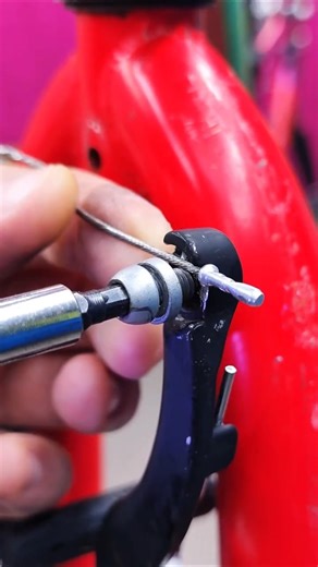 Removing V-brake bicycle brakes.