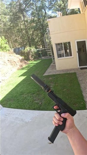 suppressed glock with extended mag