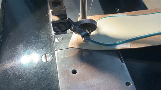 Sewing the edge on boot pulls; video is not speeded up. The man who taught me to sew was accustomed to running small factories and he taught me to stitch for factory production. Stick the next one under and keep going is also a factory technique. | Sorrell Custom Boots