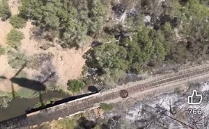 14K views · 237 reactions | A helicopter with a long line protecting a train bridge. The capabilities of the machines combined with the skills of the pilots and crew, make heavy helicopters an important resource in fighting wildfires. | Wildfire HQ | Facebook
