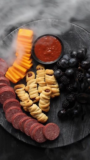 2.2K views · 32 reactions | Who’s going to try these scary-good sausage mummies? Learn how to make them: https://bit.ly/44Q0z3J | Hickory Farms | Facebook