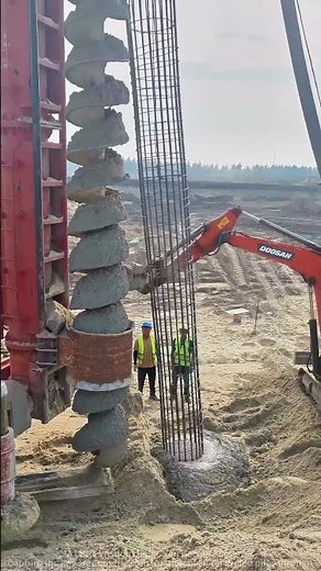 Helical Pile Construction on Construction Site: Workers and Machinery Work Seamlessly! Details