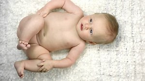 Rack Focus Baby Laying On Back Stock Footage Video (100% Royalty-free) 5973173 | Shutterstock