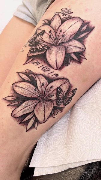 Lily and Butterfly Tattoo Ideas for Thighs