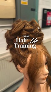 It's so lovely to see this Level 3 learner from JET Hairdressing Academy with her bridal hair up. 👰‍♀️👰‍♀️ Show your appreciation for this 🙌 ⬇️ #pivotpointmannequin #bridalhair #hairup #haireducation #hairpractice #longhairstyling | Pivot Point UK