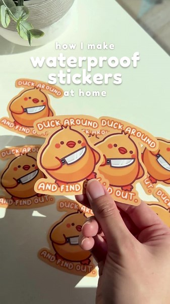 How I make waterproof stickers at home! ✨ Here’s a bit of the process behind making die cut stickers. I use printable vinyl over regular sticker paper for its waterproof nature. However, since printer ink can fade over time when exposed to water, it’s important to apply a laminate layer on top to provide extra protection! This sticker is available in my shop! (link in bio) 🐥🔪 Save this if you found it helpful! #smallbusiness #smallbusinessowner #etsyshop #etsyseller #sticker #stickershop #stic