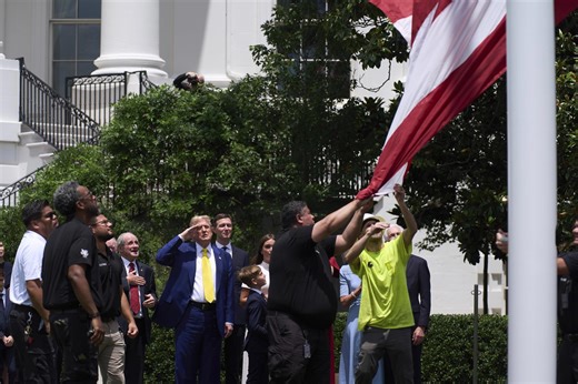Trump salutes U.S. flag raised on new pole at the White House
