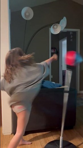 Punching Bag Hits Kid in Her Face While She Learns How to Punch - 1397320