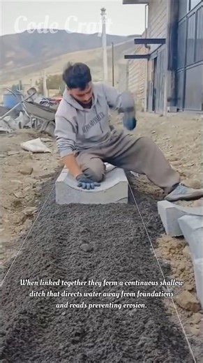 Construction Worker Setting Concrete Swale