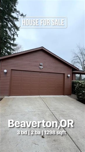 Entry with new skylights opens to a spacious, vaulted living room with hardwoods floors.