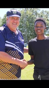 Principal Loubser congratulates Avuyile Bilatyi for breaking the Middelburg Primary School (MPS) long jump record! | Middelburg Observer